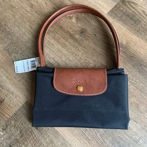 New with tags. Longchamp large LePliage tote.
